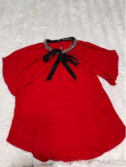 Blusa roja elegante