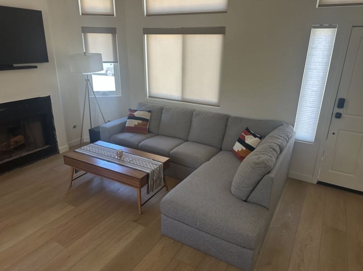 Living Spaces Gray Sectional Sofa Couch with right facing chaise