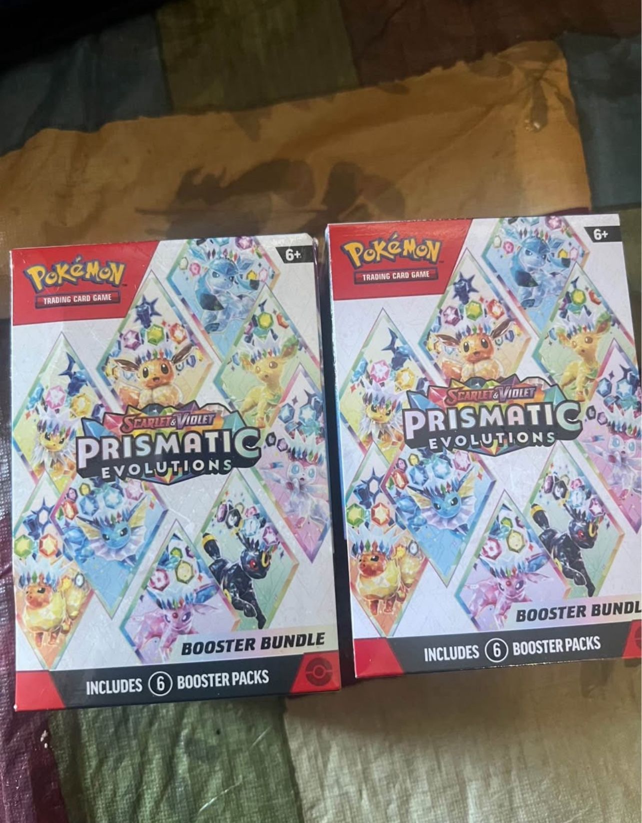 Prismatic evolution booster bundles