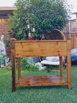 Planter box stand