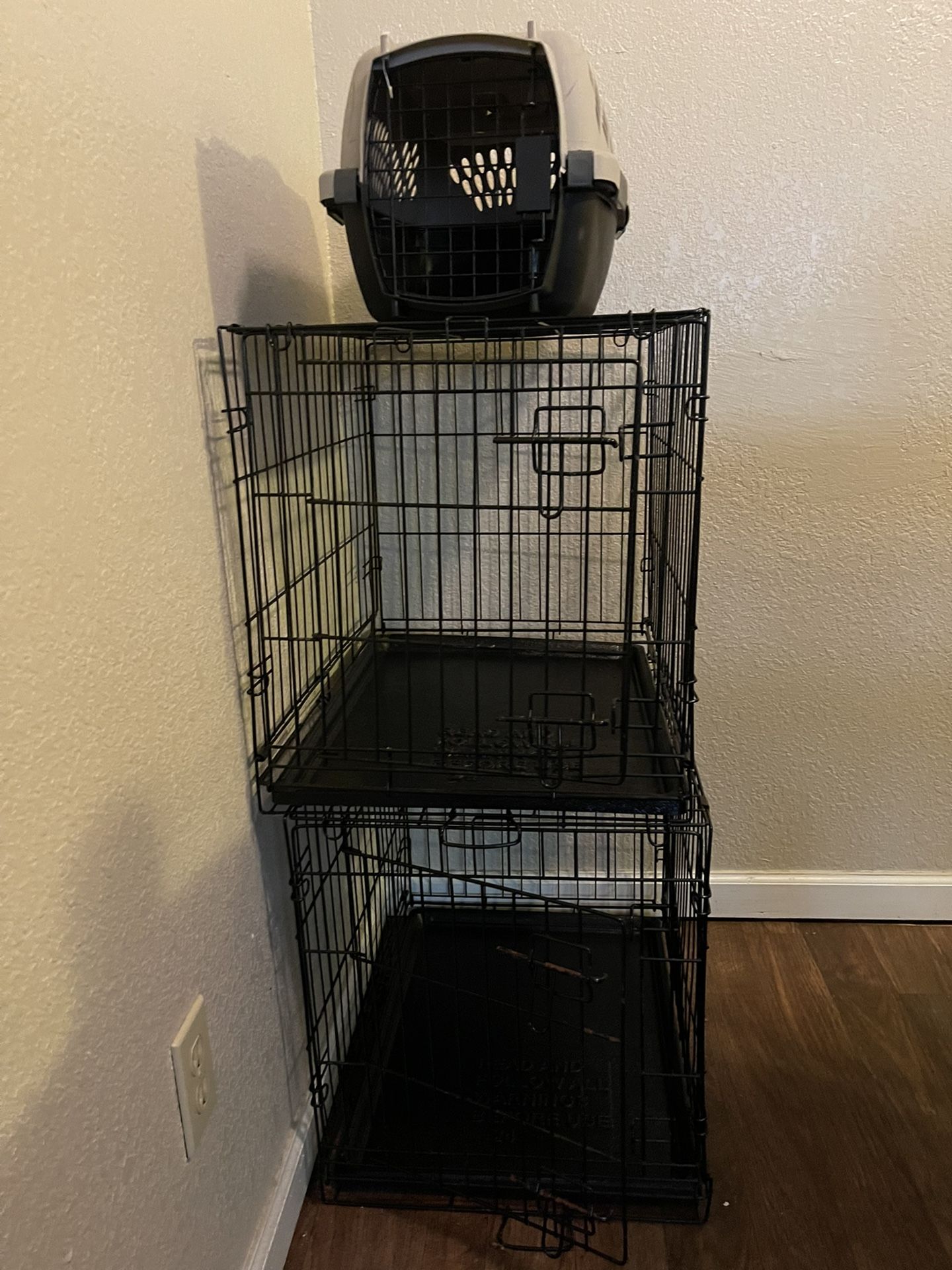 2 Medium dog kennel and 1 Small carry on kennel