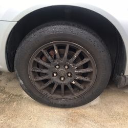 RIMS & Tires 16” ,fits Chrysler Sebring I have 5 rims 4 black 1 chrome asking $250.00 OBO