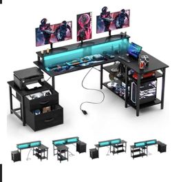 Double-sided L-shaped computer desk gaming desk with power sockets and LED light strip, storage rack, black