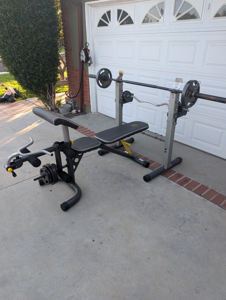 Gold's Gim XRS Weight Bench And Olympic Bar. NO WEIGHTS INCLUDED