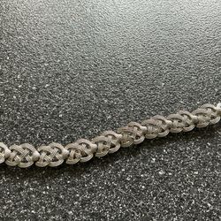 Vintage silver-tone braided bracelet, potentially from the Monet "Bolero" line from the 1960's.