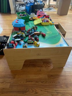 KidKraft train table and Thomas trains