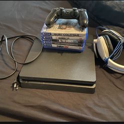 1TB Ps4 Slim with 6 Games and DualShock Controller with Headset