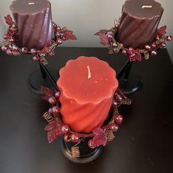 Black iron candle holder with three candles