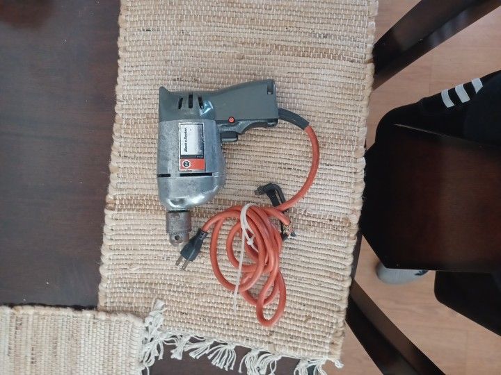  vintage Black & Decker corded electric drill, 3/8-inch model. 