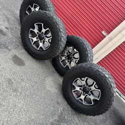 17” OEM Jeep Wrangler Rubicon Wheels And Falken MT Tires 