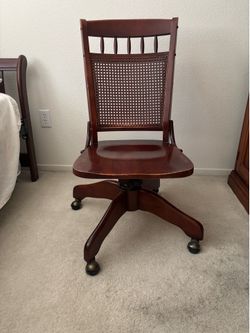 Cherry wood Cane back rolling desk chair