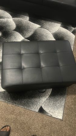 Couch, ottoman, rug