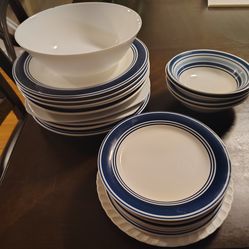 Assortment of plates bowls glasses