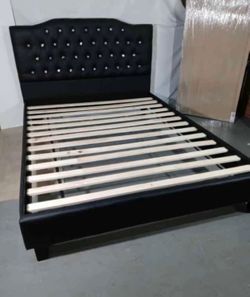 Brand new black queen bed ( mattress sold separately)