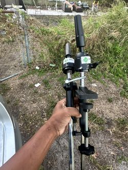 Two MANNEQUIN HEAD CLAMPS