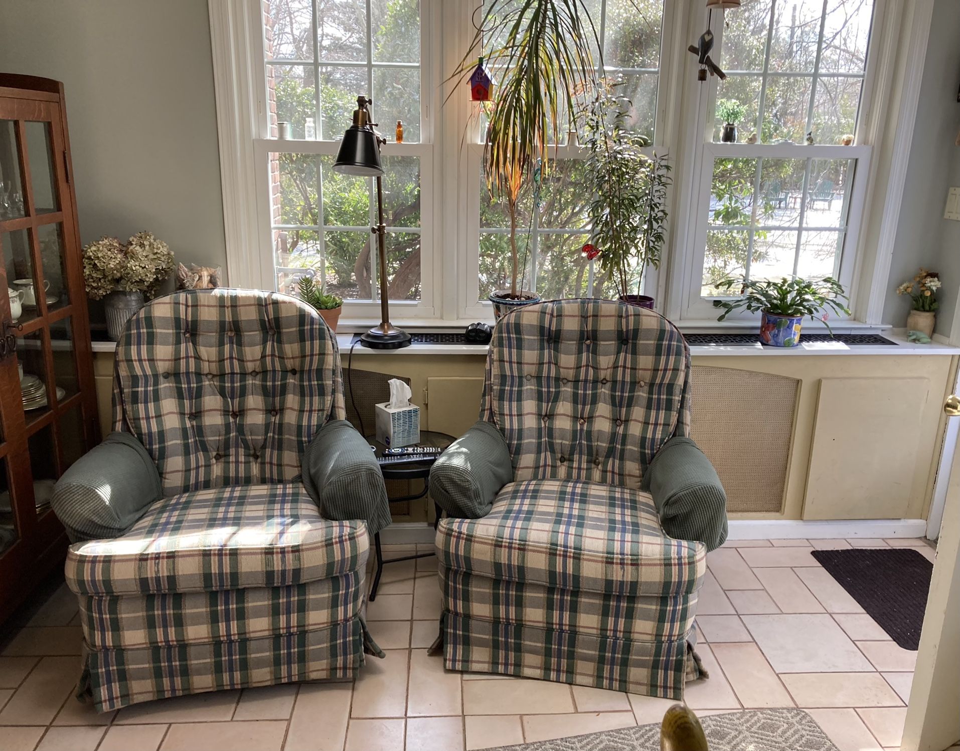 Two Swivel Rocking Chairs