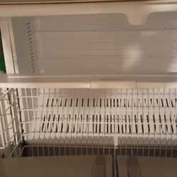 Stainless Steel Double Door Refrigerator Freezer With The Freezer At The Bottom Drawer