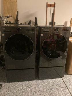 LG washer/dryer model WM6698hba high efficiency all-in-one With Pedestal.