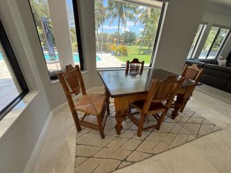Solid 3x5 wood table w/4 chairs and rug