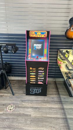 1-up ms Pac-Man arcade machine