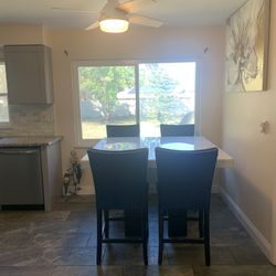 Marble Table With 4 Blue Chairs 