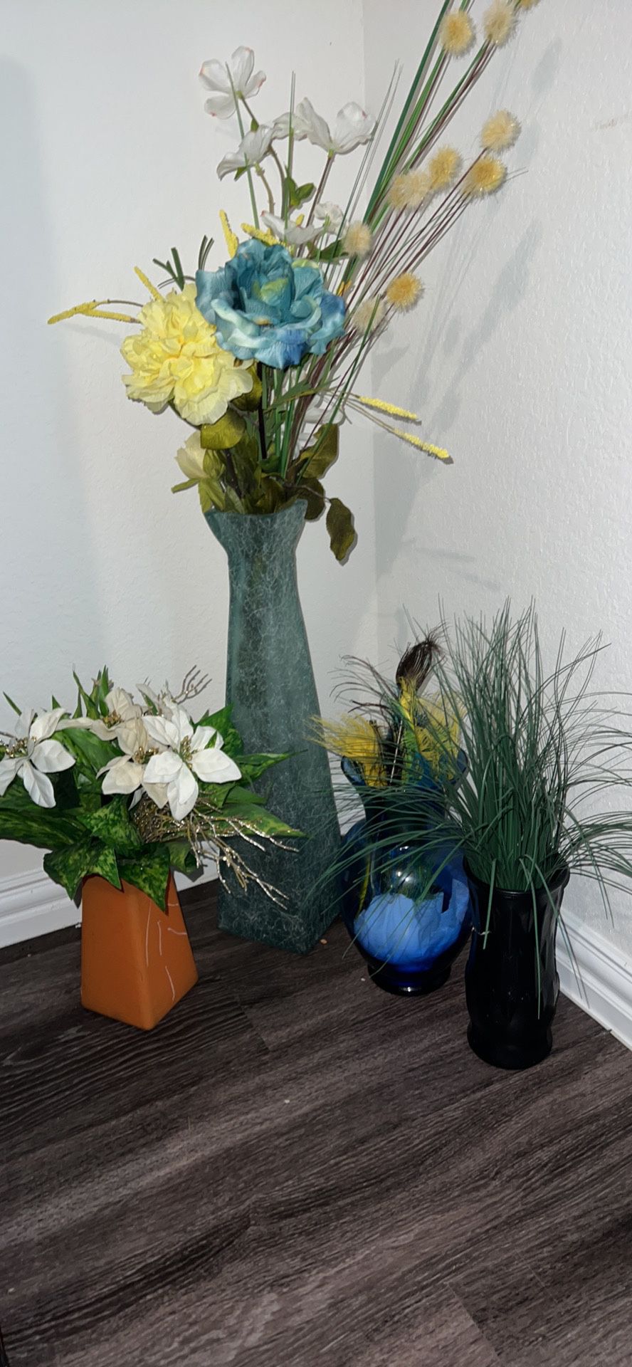 Multiple Vases And Fake Plants