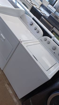 Whirlpool he top load washer and electric dryer set