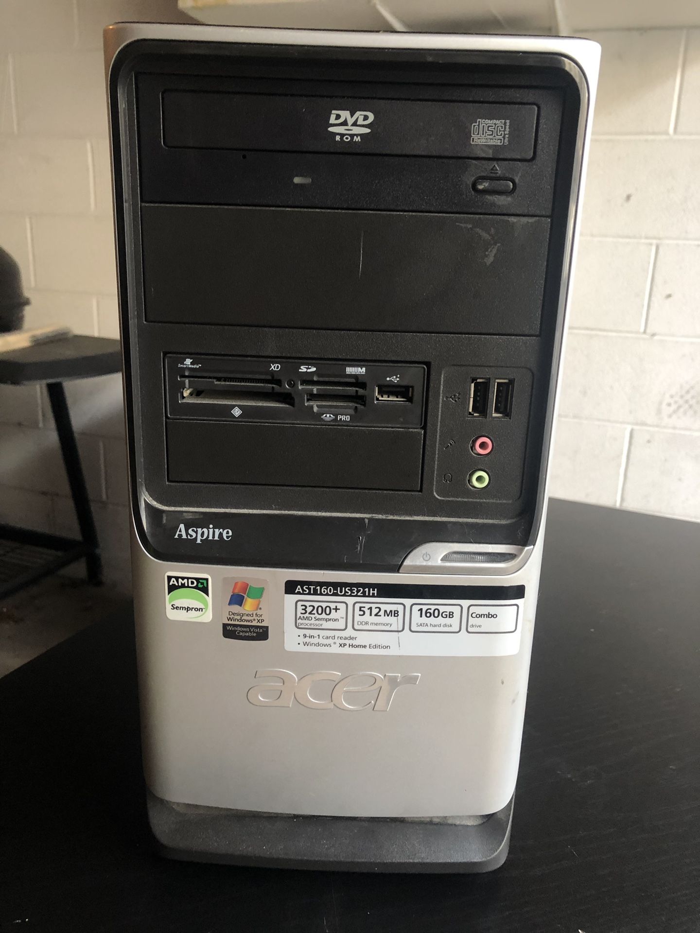 ACER computer tower with LENOVO display