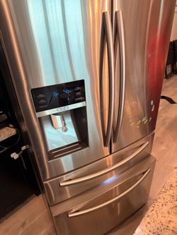 Samsung refrigerator stainless steel 4 door. 450$