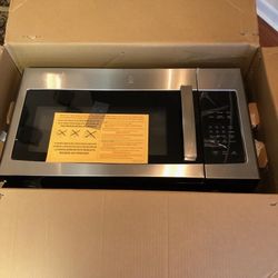 GE OVER THE RANGE STAINLESS STEEL MICROWAVE 300.00 New