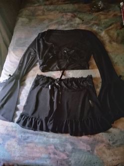 A Sexy Woman's Black See Through Long Sleeve Top w/ Skirt & Panties