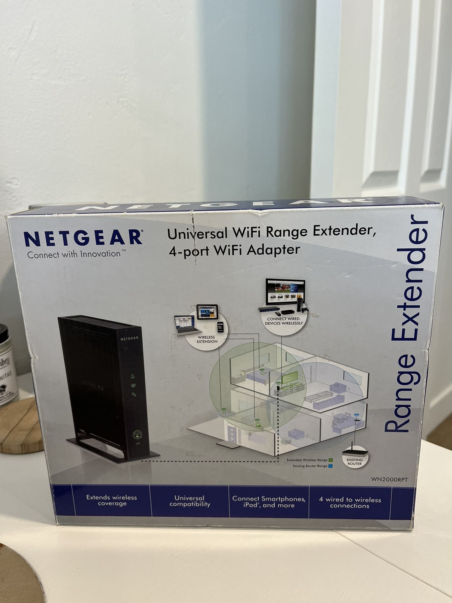  NETGEAR N300 Wi-Fi Range Extender - Desktop Version with 4-Ports (WN2000RPT)