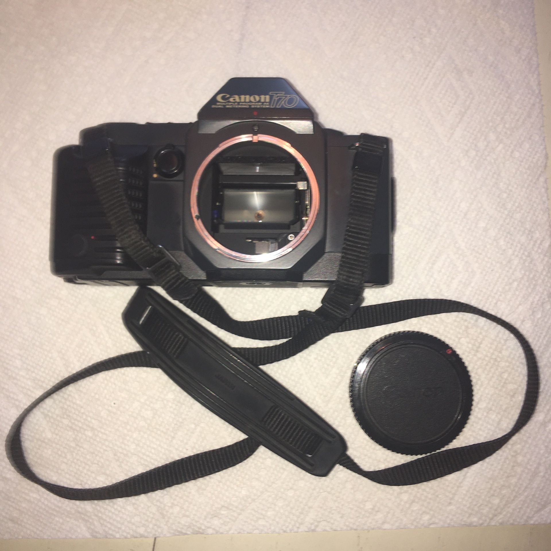 Canon T-70 camera body only. 5 exposure modes