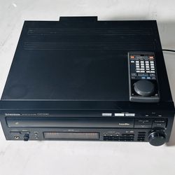 This is a Pioneer CLD-2090 CD/CDV/LD LaserDisc player.  player that supports CD, CDV, and LD formats. 