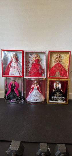 1(contact info removed) New In The Box Holiday Barbie’s - $15 each