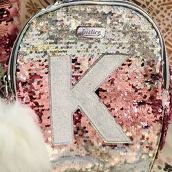 Super cute Flip Sequin Pom Pom Initial K mini backpack.  Available in the letter K which can represent Kindness. Initial can be removed upon request s