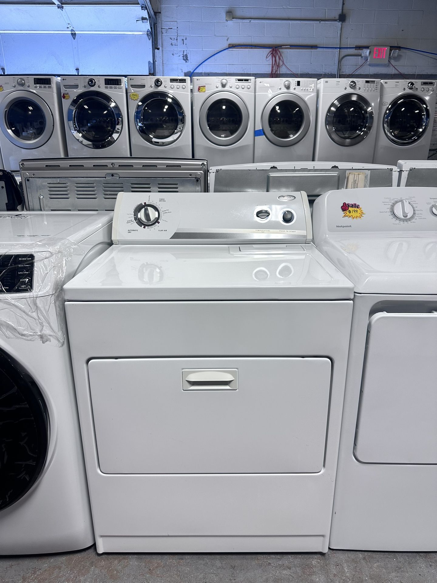 Whirlpool )Electric Dryer  works perfectly, is very clean, and comes with a warranty. 