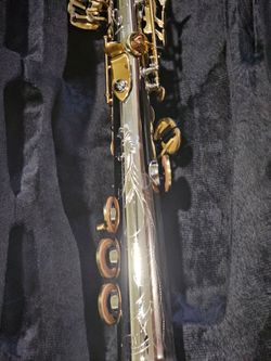 Beutifully carved unbranded soprano saxophone