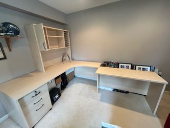 Solid wood corner desk—great condition. $125