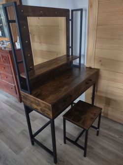 Wood and metal Ashley vanity with lights and chair. 58x36x16