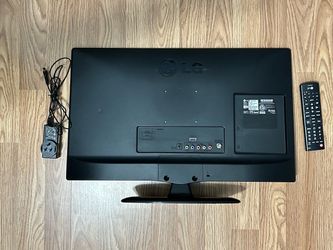 LG Flat Screen TV with Remote and Power Adapter