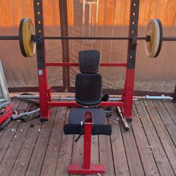 Bench Press, Olympic Bar, and weights.