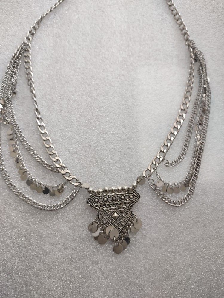 Silver tone three strand chain, Excellent condition.