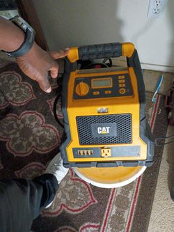 Cat Power Station with 1,200-Peak-Amp Jump Starter, Tire Compressor, and Power Inverter, CJ1000DXT in Yellow
