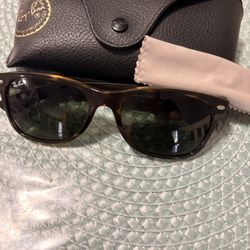 Ray-Ban sunglasses in excellent condition, purchased at Macy's.