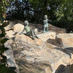 Bronze children statue with turtle