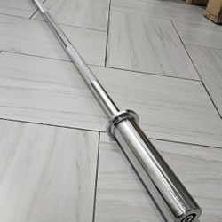 New 57inch- 16.5lbs Barbell. Holds 2inch Olympic Weight Plates. 