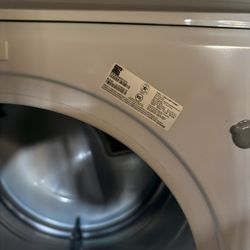 A Set of Kenmore Washer and Gas Dryer 