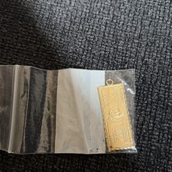 10k gold 100 bill pendant