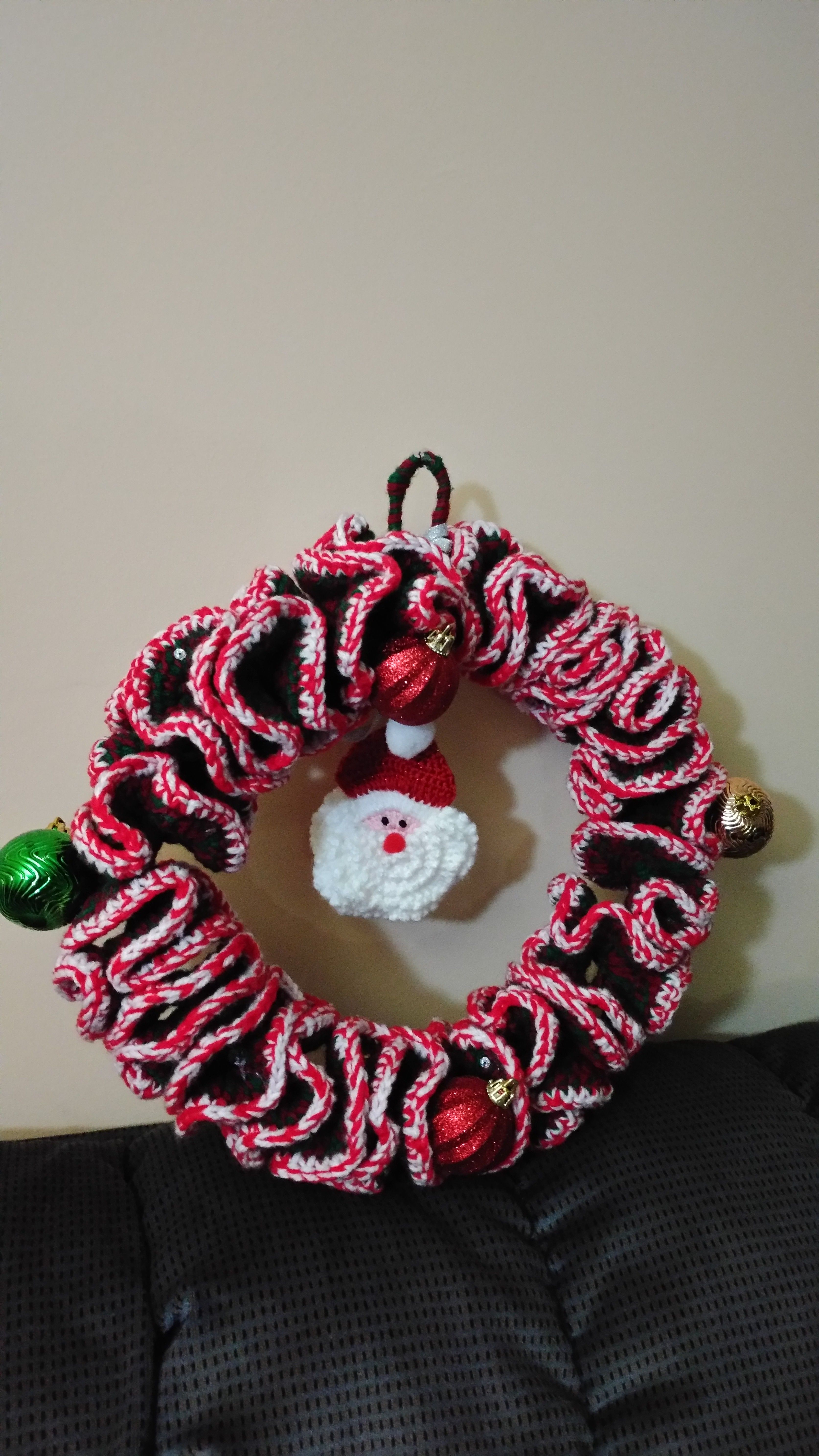 Handmade crochet wreath with santa
